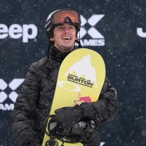 Olympic Snowboarder Taken Off Mountain on a Stretcher Following Violent Crash