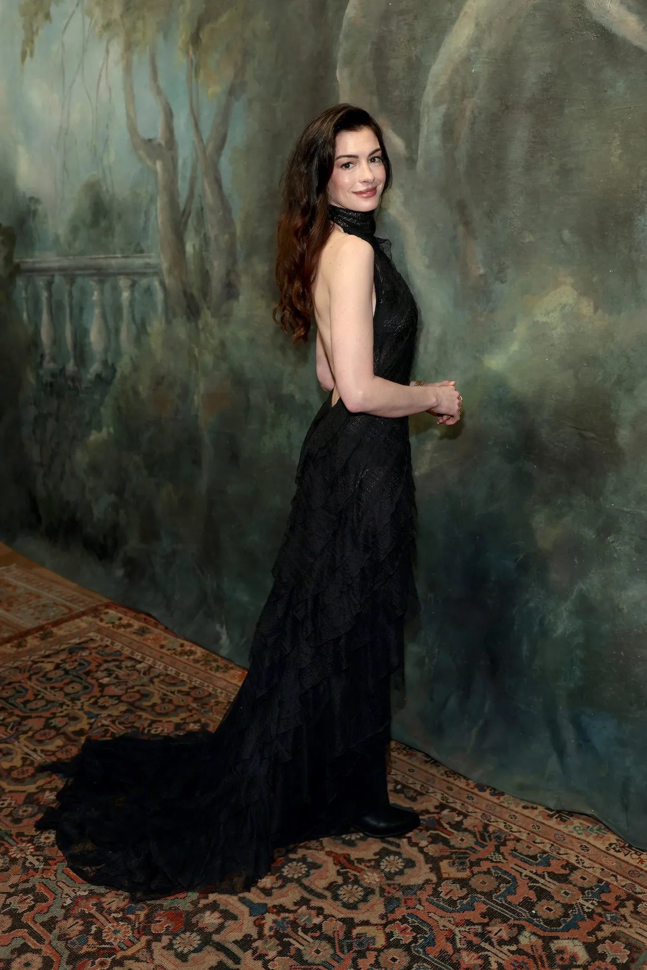 Anne Hathaway Is Ageless in a Semi-Sheer Dress at Ralph Lauren Fashion Show