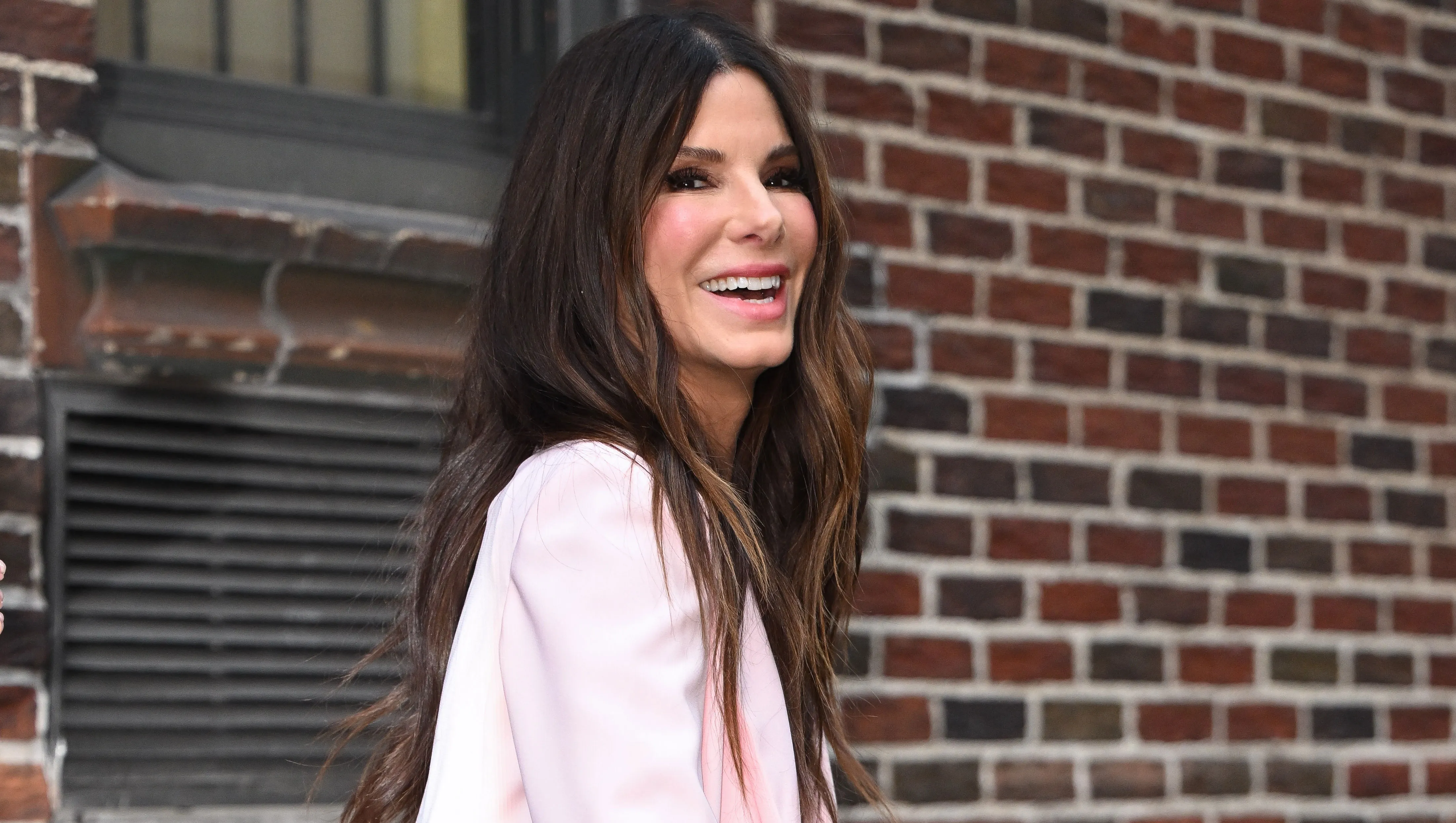 NEW YORK, NEW YORK - MARCH 14: Sandra Bullock is seen outside the 'The Late Show with Stephen Colbert' at the Ed Sullivan Theater on on March 14, 2022 in New York City. (Photo by James Devaney/GC Images)