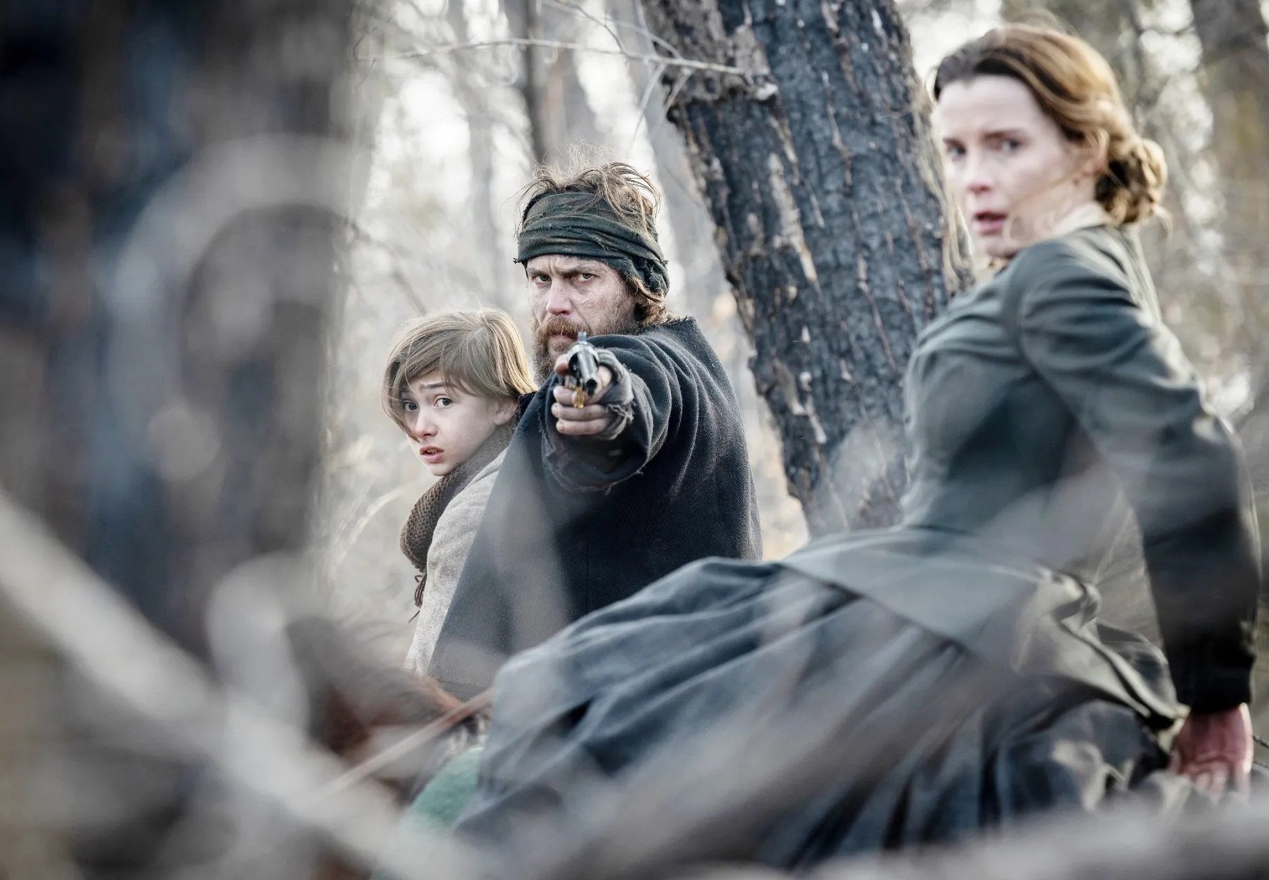 Preston Mota, Taylor Kitsch and Betty Gilpin in American Primeval season 1