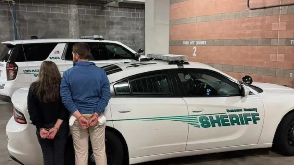 A photo shows two of the suspects soon after they were arrested