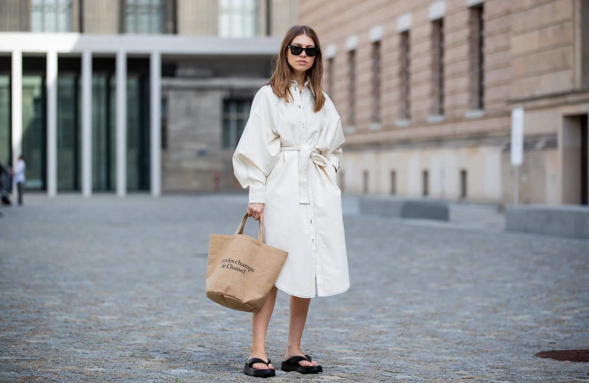 BERLIN, GERMANY - JULY 07: Swantje Soemmer is seen wearing white dress Blanche, Rayban sunglasses, Arket plateau flip flops, Chanel beach bag on July 07, 2020 in Berlin, Germany. (Photo by Christian Vierig/Getty Images)