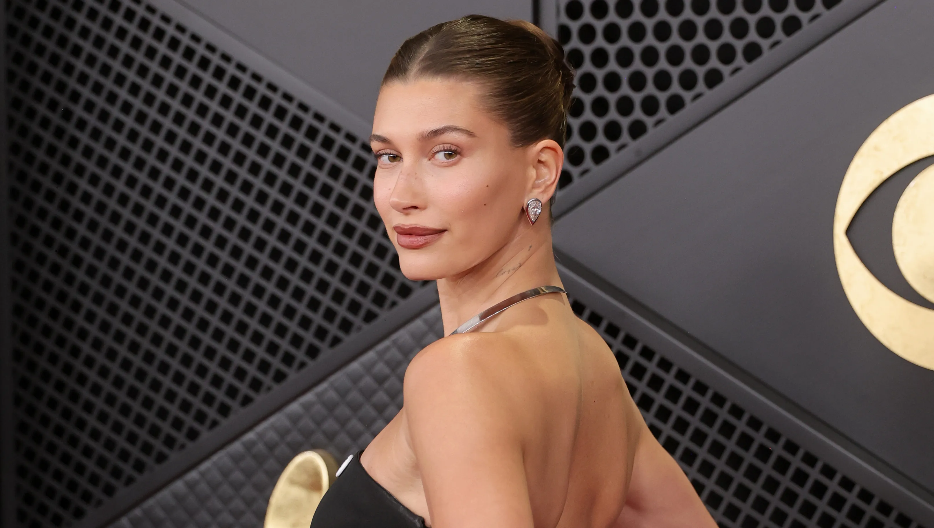 LOS ANGELES, CALIFORNIA - FEBRUARY 01: (FOR EDITORIAL USE ONLY) Hailey Bieber attends the 68th GRAMMY Awards at Crypto.com Arena on February 01, 2026 in Los Angeles, California. (Photo by Brianna Bryson/WireImage)