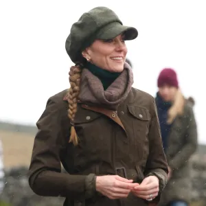 HOPE, ENGLAND - JANUARY 27: Catherine, Princess of Wales joins Mind Over Mountains, a charity offering professional mental health support through therapeutic outdoor experiences, for a supported wellbeing walk in the Peak District National Park on January 27, 2026 near Curbar, England. The Princess of Wales visited the north of England to highlight how community, nature and creativity can help those struggling with trauma, isolation and mental health challenges. (Photo by Ian Vogler - WPA Pool/Getty Images)
