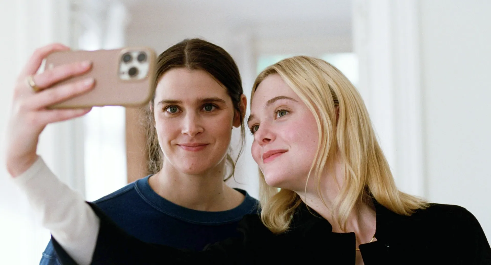 Inga Ibsdotter Lilleaas and Elle Fanning in Sentimental Value