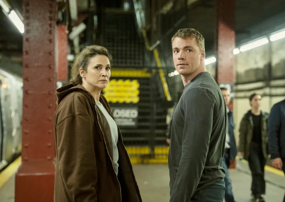 Michaela Watkins and Gabriel Basso in The Night Agent season 3