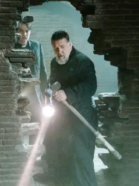 Daniel Zovatto and Russell Crowe in The Pope's Exorcist