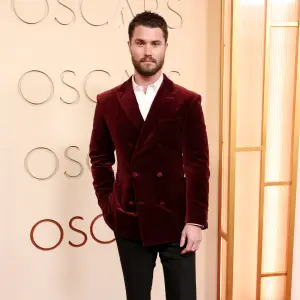 Chase Stokes Smolders in Red at 98th Academy Awards Oscars 2026 After Kelsea Ballerini Drama