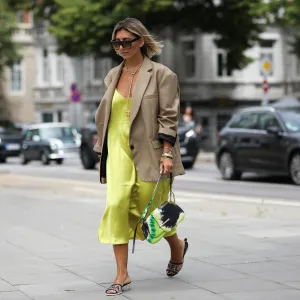 HAMBURG, GERMANY - JUNE 20: Aylin Koenig wearing The Frankie Shop blazer, Chanel shoes, Prada bag, Arket dress, Celine Sunglasses on June 20, 2019 in Hamburg, Germany. (Photo by Jeremy Moeller/Getty Images)