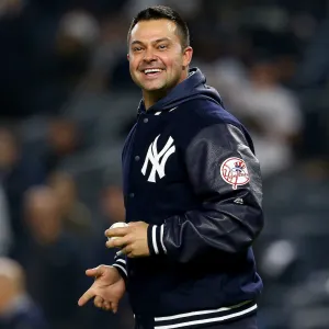How Former Yankee Nick Swisher Embraces Being a Girl Dad Softball Coach