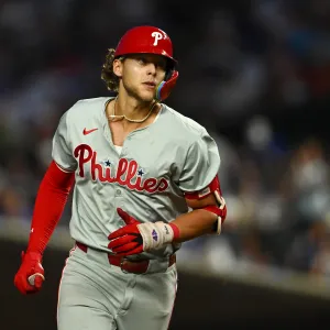 CHICAGO, ILLINOIS - JULY 03: Alec Bohm #28 of the Philadelphia Phillies rounds the bases on a two-run home run in the sixth inning off Shota Imanaga of the Chicago Cubs at Wrigley Field on July 03, 2024 in Chicago, Illinois. (Photo by Quinn Harris/Getty Images)