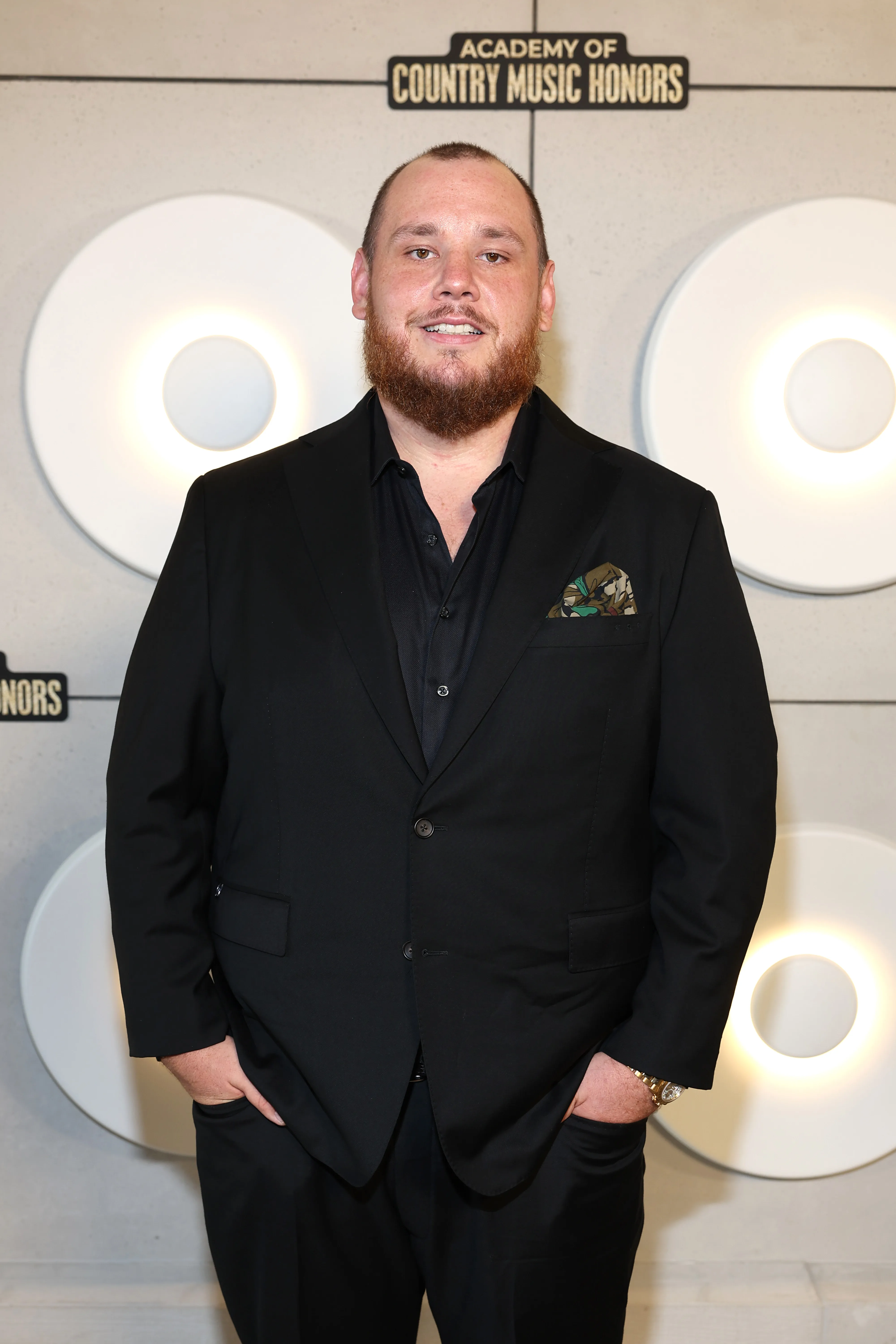 Luke Combs on a red carpet.