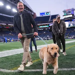 ESPN Announcer Kirk Herbstreit Responds to Criticism of His ‘Annoying’ Golden Retrievers