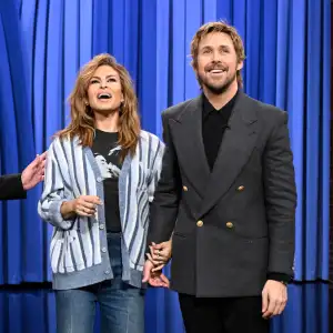 GettyImages-2264388563-Eva-Mendes-and-Ryan-Gosling-Hold-Hands-in-Rare-Joint-Appearance.jpg