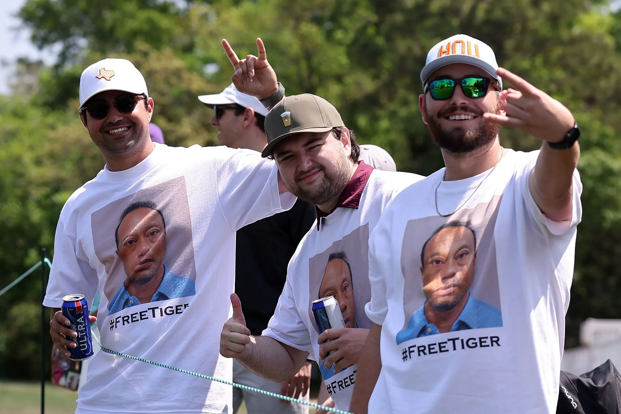 GettyImages-2268811288 Fans wearing Tiger Woods shirts