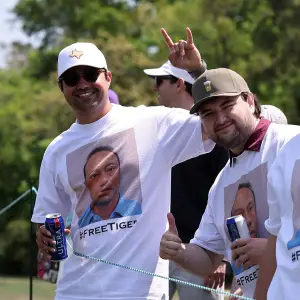 GettyImages-2268811288 Fans wearing Tiger Woods shirts
