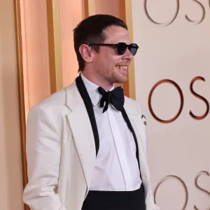Jack OConnell Wears Blood-Soaked Fangs at the 2026 Oscars GettyImages-2266712600
