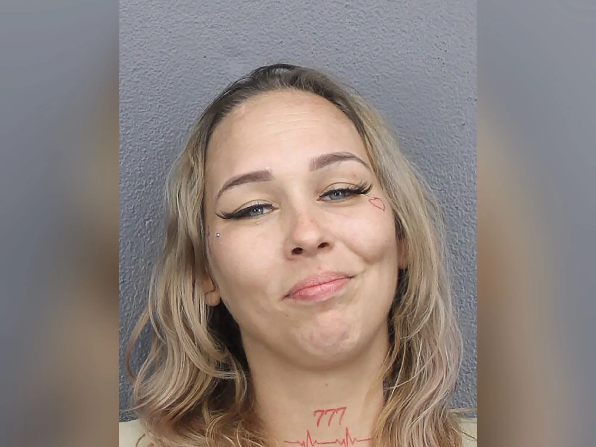 Magdalena Dybkowska Mugshot Florida Mom with Face Tattoo Grins in Mugshot After Trying to Kill Sister