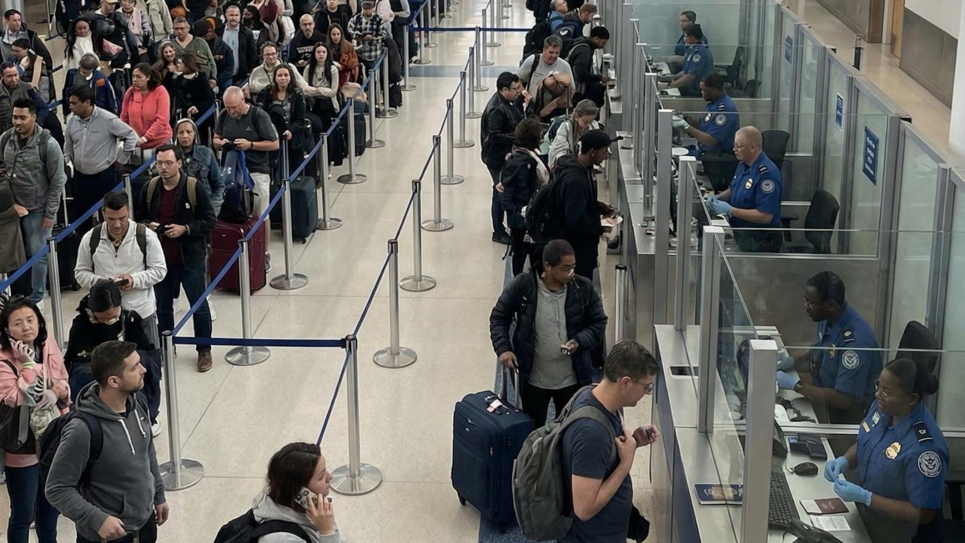 Traveler using facial recognition passport control at airport