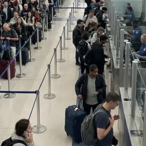 Traveler using facial recognition passport control at airport