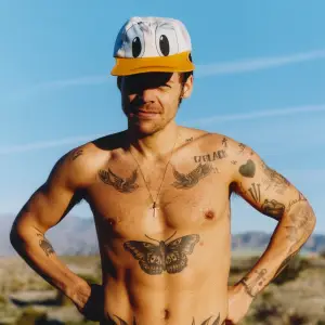 Harry Styles shirtless in 'Runner's World' magazine