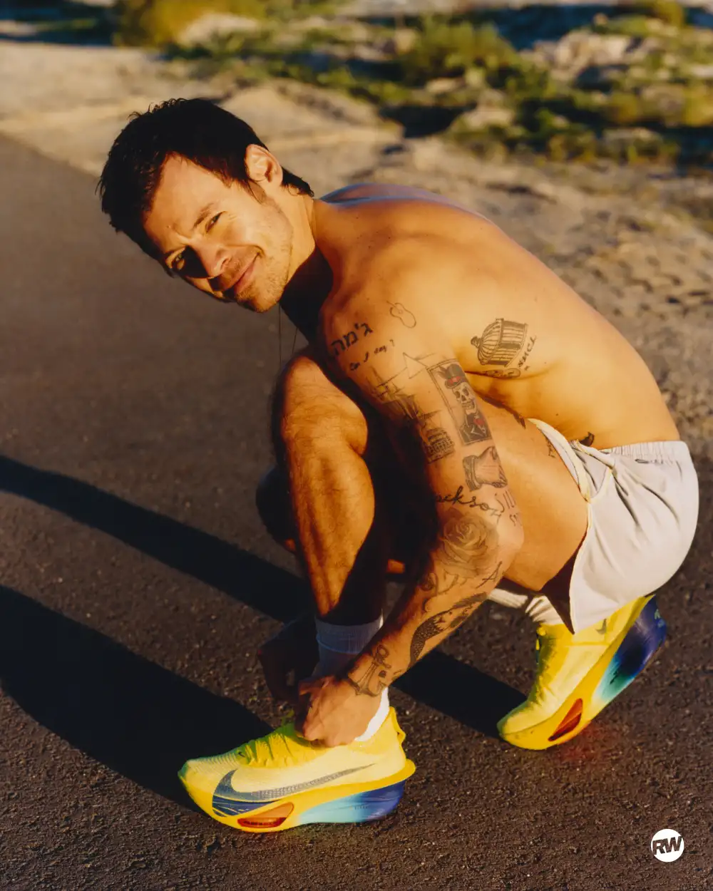 Harry Styles shirtless in 'Runner's World' magazine