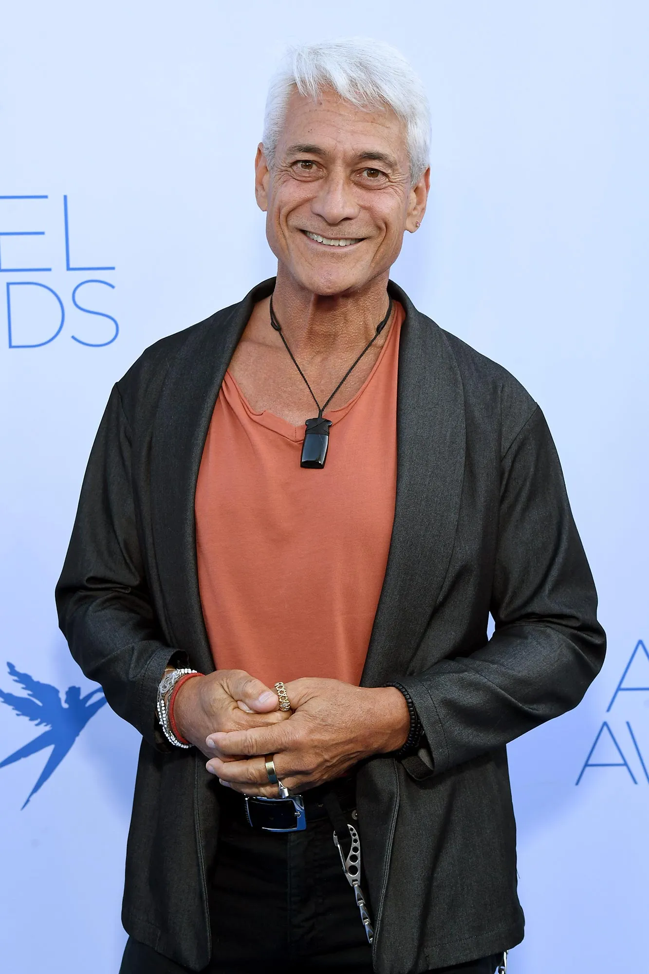 Why Greg Louganis Moved Back to US After Selling Medals to Leave Country