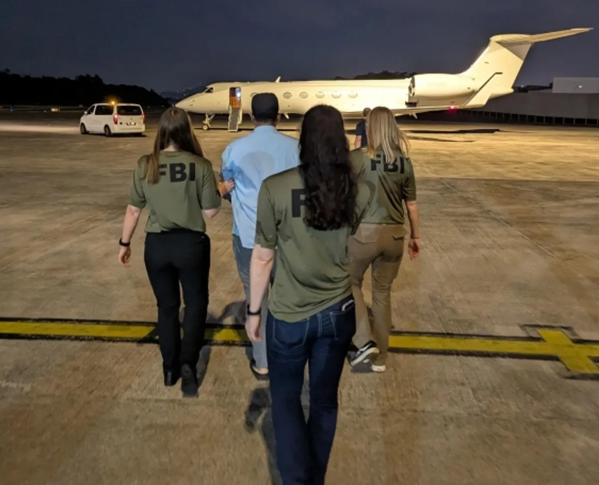 FBI agents take Zobaidul Amin into custody