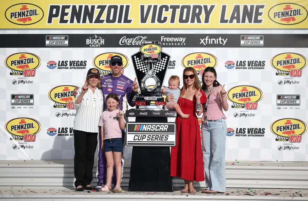 2266708988 Denny Hamlin Celebrates Emotional Win With Family Months After Losing Father in House Fire