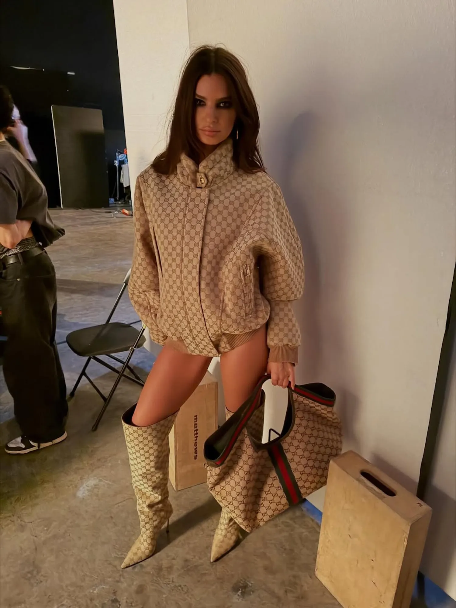 Emily Ratajkowski Goes Pantsless in Knee-High Gucci Boots, Matching Jacket and Bag