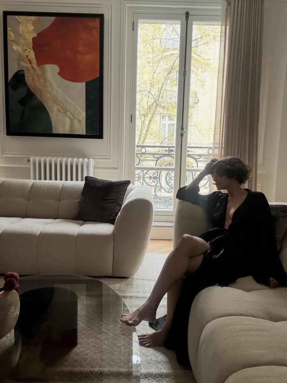 Halle Berry Narrowly Avoids a Nip Slip While Lounging in a Loosely Tied Black Bathrobe