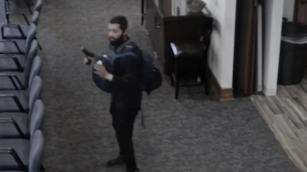 A man with a gun is seen in a Texas synagogue during a hostage situation