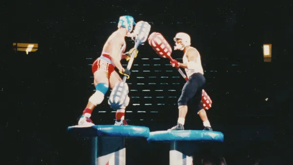 Two gladiators in Muscles & Mayhem: An Unauthorized Story of American Gladiators