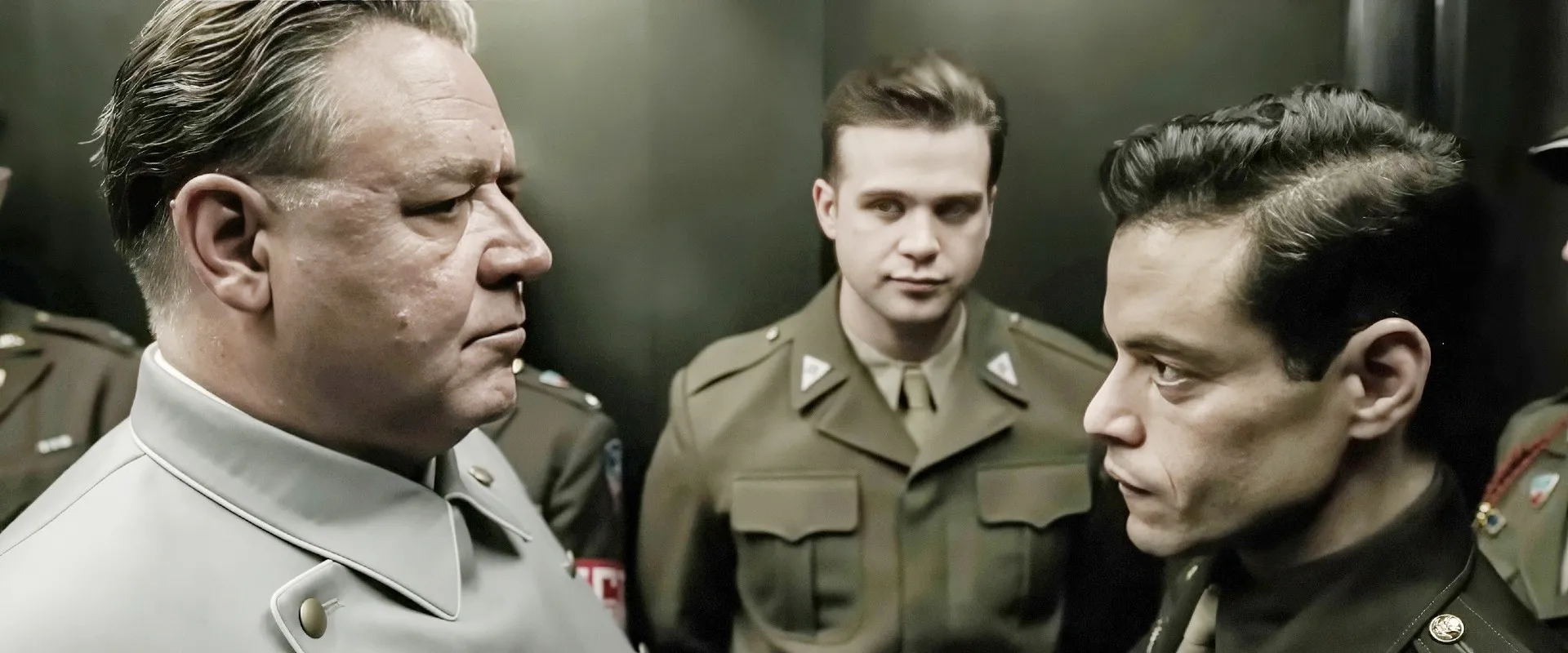 Russell Crowe as Hermann Goring, Leo Woodall and Rami Malek in Nuremberg