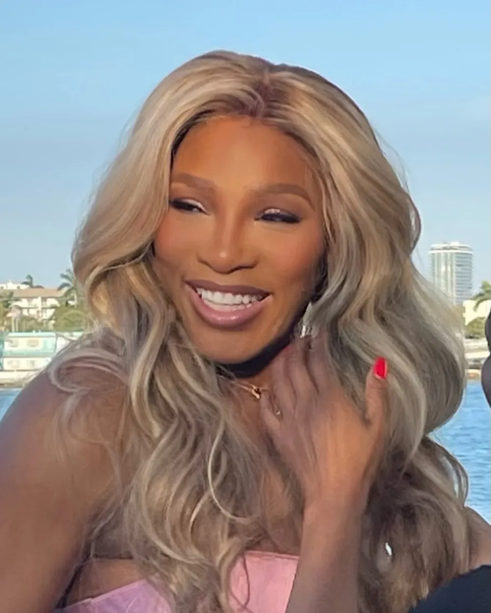 Serena Williams Goes Braless Underneath a Pink Silk Dress After Weight Loss