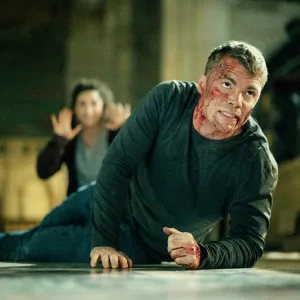 Michaela Watkins and Gabriel Basso in The Night Agent season 3