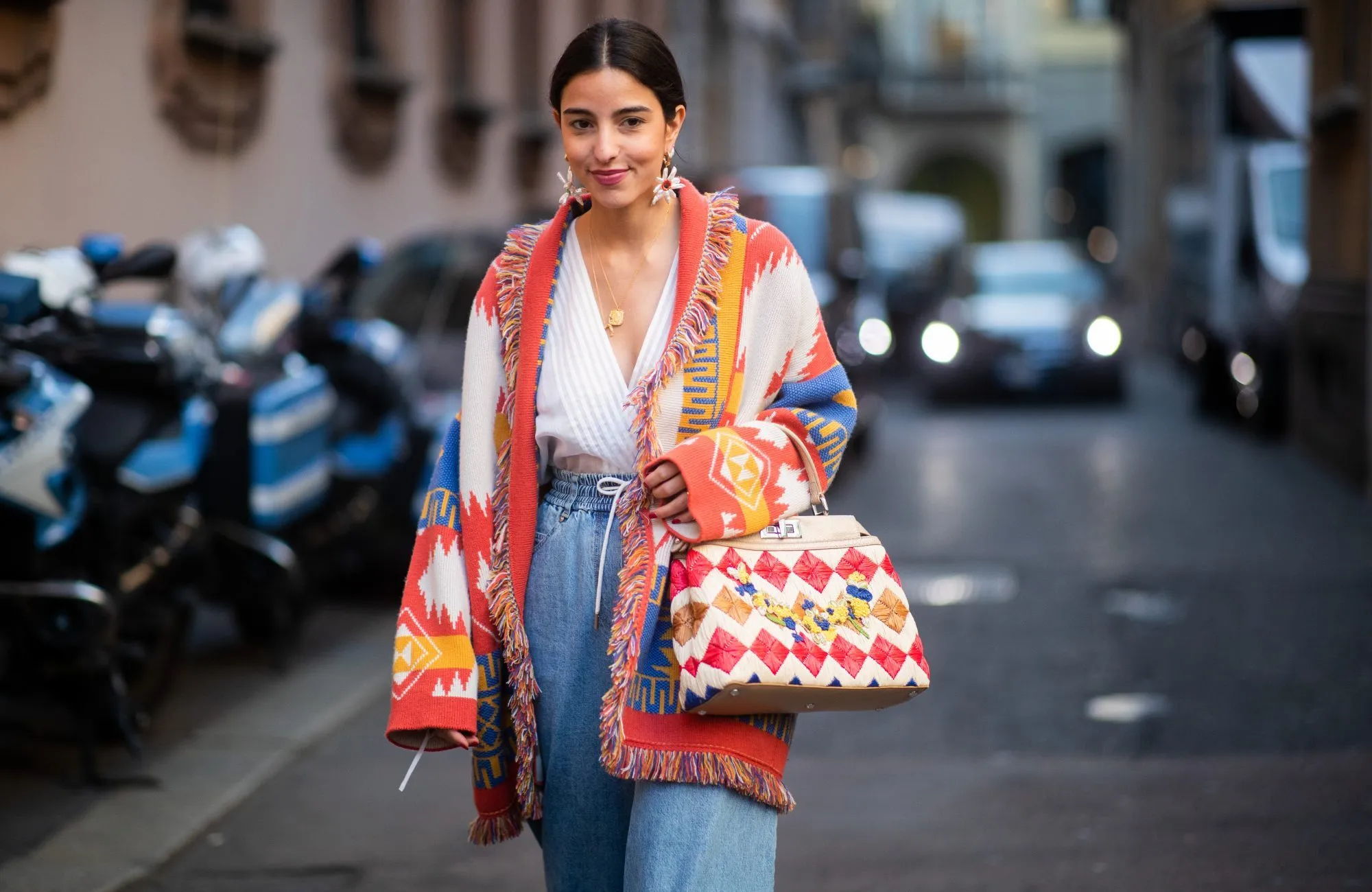 MILAN, ITALY - FEBRUARY 21: Bettina Looney is seen wearing two tone denim jeans, Fendi bag, cardigan outside Vivetta on Day 2 Milan Fashion Week Autumn/Winter 2019/20 on February 21, 2019 in Milan, Italy. (Photo by Christian Vierig/Getty Images)