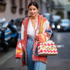 MILAN, ITALY - FEBRUARY 21: Bettina Looney is seen wearing two tone denim jeans, Fendi bag, cardigan outside Vivetta on Day 2 Milan Fashion Week Autumn/Winter 2019/20 on February 21, 2019 in Milan, Italy. (Photo by Christian Vierig/Getty Images)