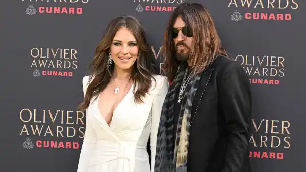 Elizabeth-Hurley-and-Billy-Ray-Cyrus-Oliviers-GettyImages-2270995344