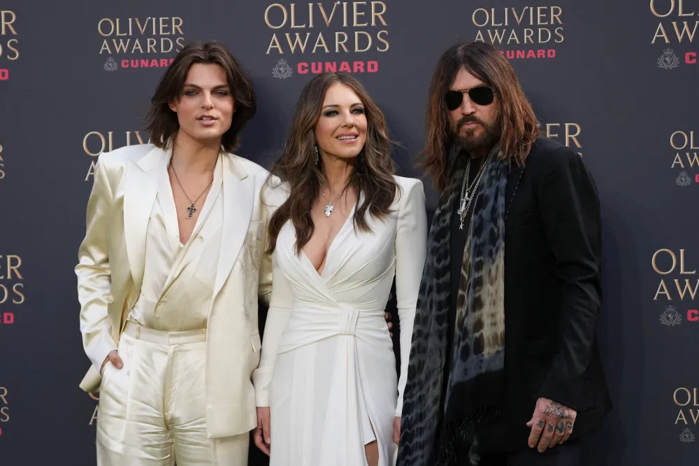 Elizabeth-Hurley-and-Billy-Ray-Cyrus-GettyImages-2270537100