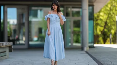 Anna Wolfers wearing light blue flowy dress via Goldig Shop and blue heels on May 31, 2021 in Hamburg, Germany.