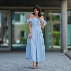 Anna Wolfers wearing light blue flowy dress via Goldig Shop and blue heels on May 31, 2021 in Hamburg, Germany.