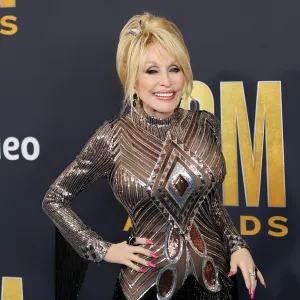 GettyImages-1382632890 Dolly Parton Has Secret Tattoos Quotes About Her Ink