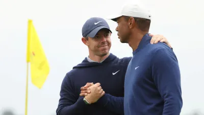 GettyImages-1479448264 McIlroy and Woods