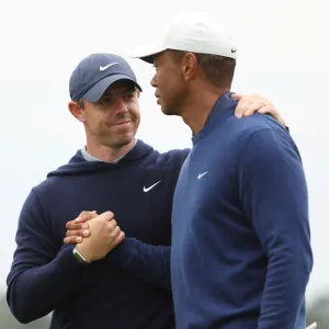 GettyImages-1479448264 McIlroy and Woods