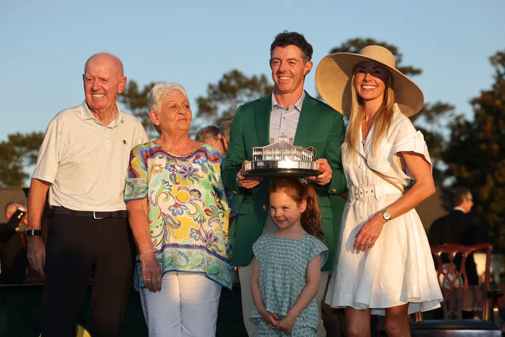 GettyImages-2271051955-Rory-McIlroys-Mom-Goes-Viral-With-Custom-Purse-Featuring-Sons-Grand-Slam-Headline