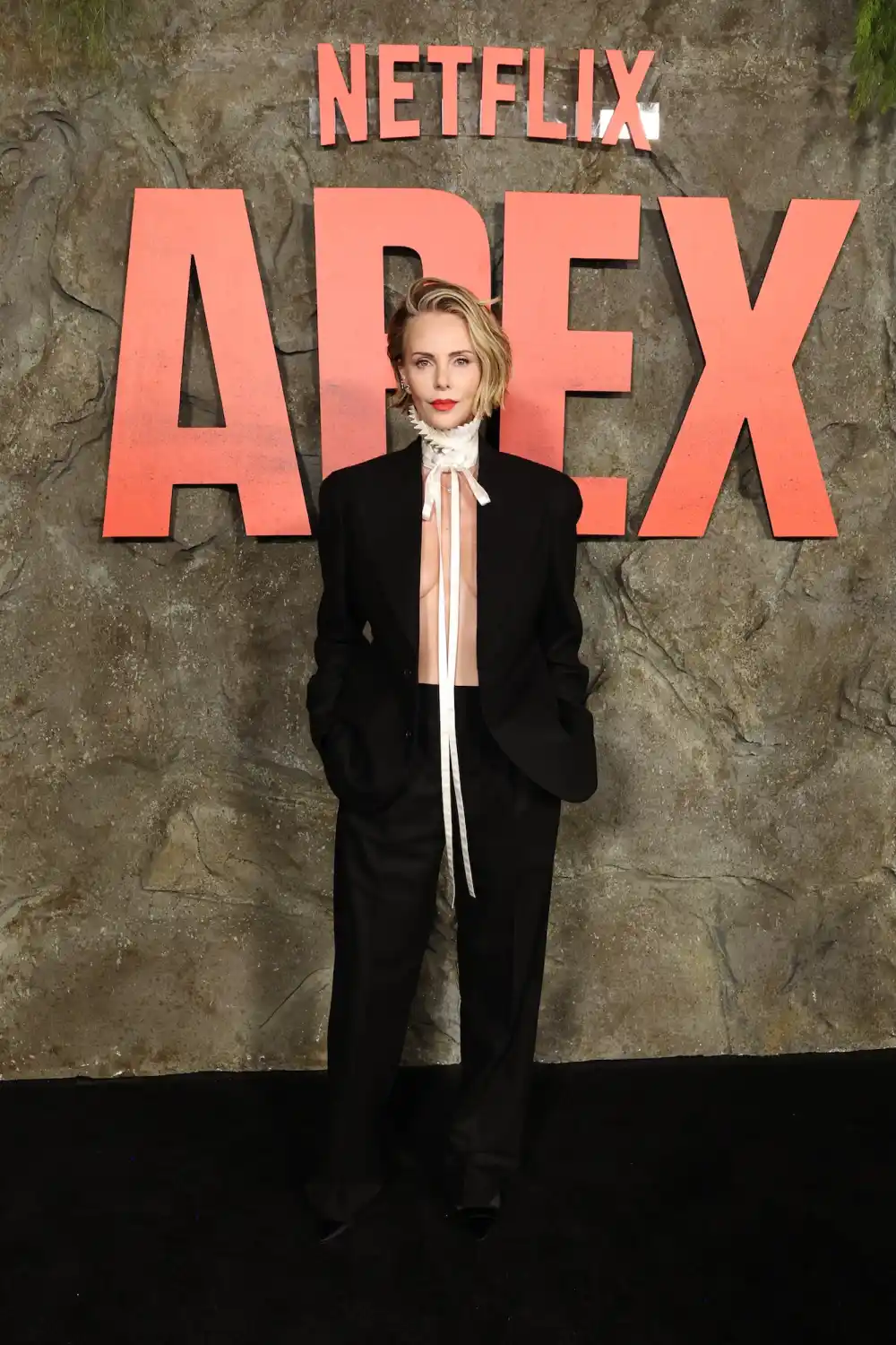 Charlize Theron Goes Topless Under Blazer, Flaunts Underboob