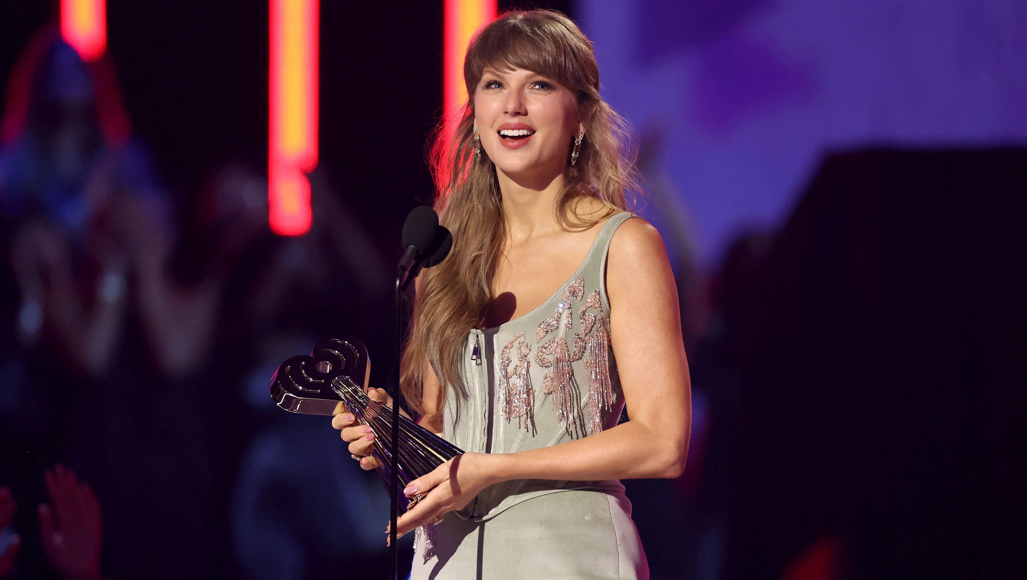 HOLLYWOOD, CALIFORNIA - MARCH 26: Taylor Swift accepts the Pop Album of the Year award onstage during the 2026 iHeartRadio Music Awards at Dolby Theatre on March 26, 2026 in Hollywood, California. (Photo by Monica Schipper/Getty Images)