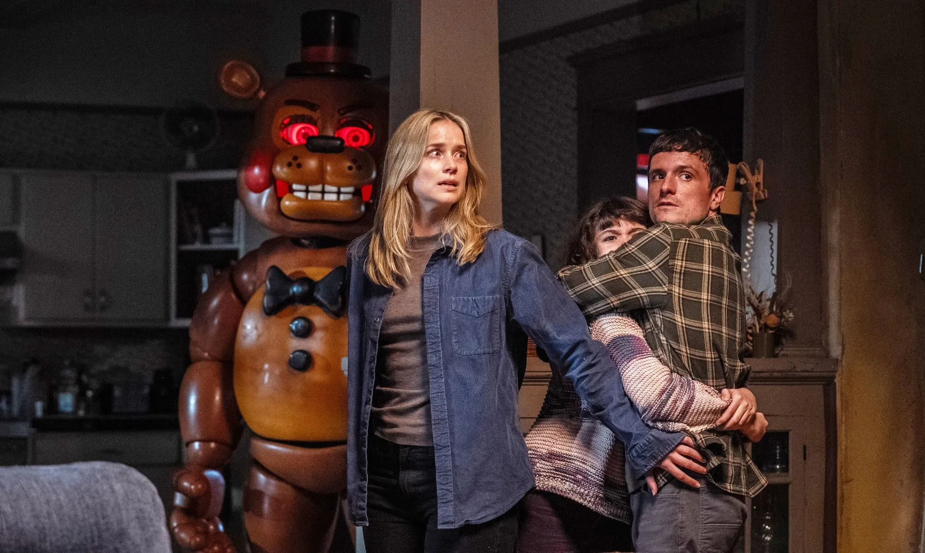 Toy Freddy, Elizabeth Lail, Piper Rubio and Josh Hutcherson in Five Nights at Freddy's 2