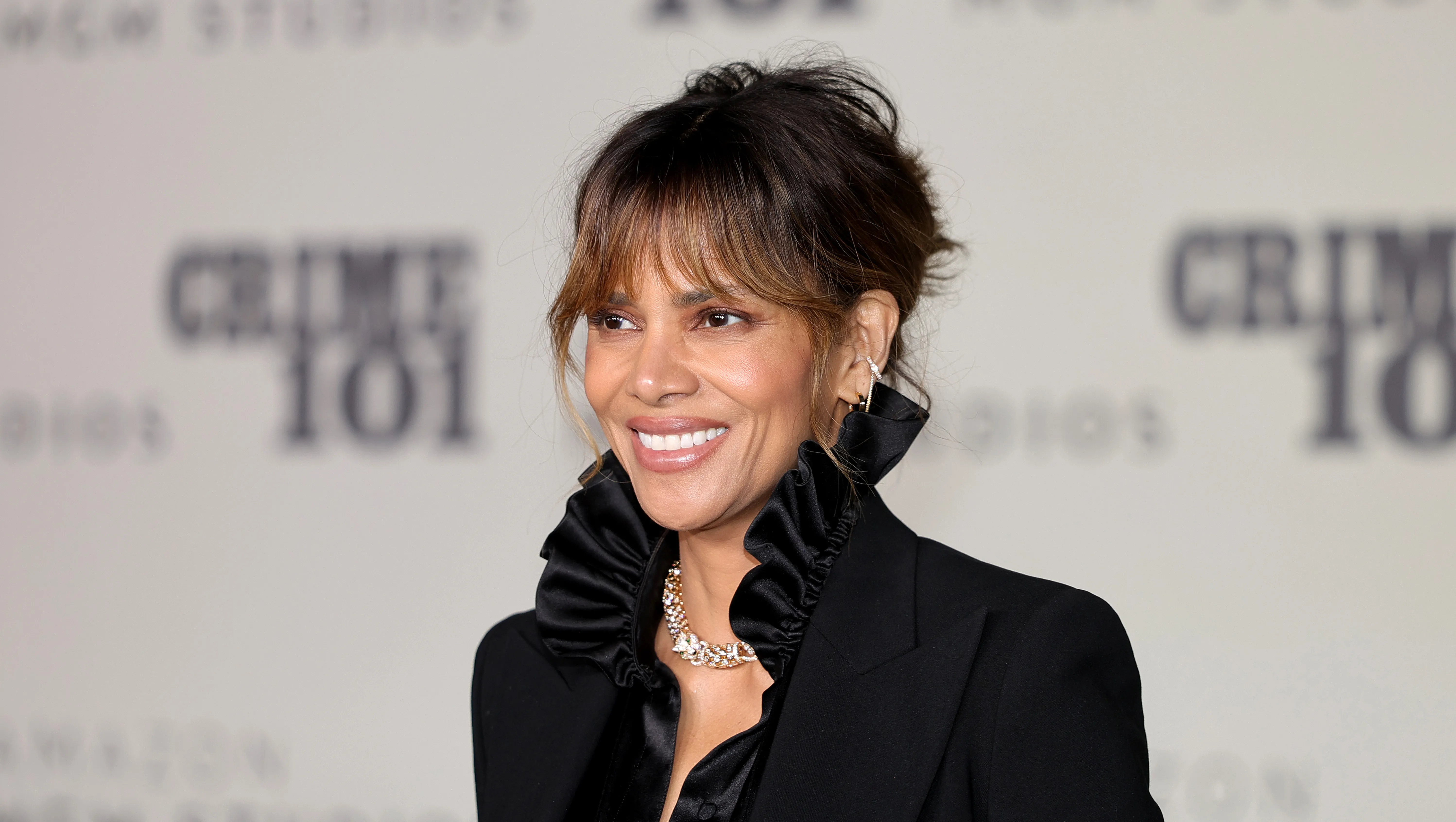 LOS ANGELES, CALIFORNIA - FEBRUARY 10: Halle Berry attends the world premiere of Amazon MGM Studios' "Crime 101" at The United Theater on Broadway on February 10, 2026 in Los Angeles, California. (Photo by Brianna Bryson/WireImage)